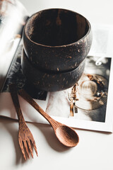 Coconut dishes. Bowl, fork and spoon from coconuts shell