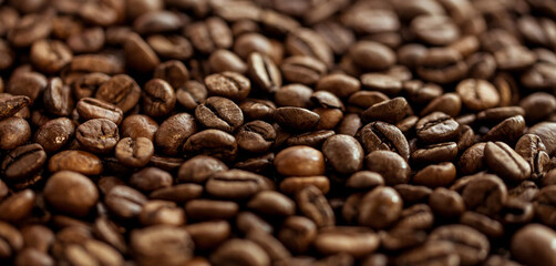 background of brown roasted coffee beans