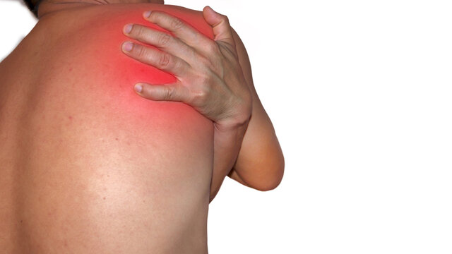 A man with a shoulder pain Pain in human body on isolated background with red dot and copy space.