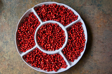 Lingonberry on white plate.
