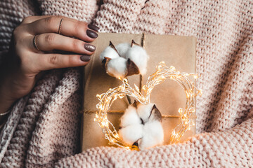 Time gifts - gift box in hand girls. Plaid, cotton, manicure.