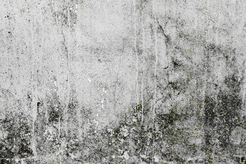 Texture of a concrete wall with cracks and scratches which can be used as a background
