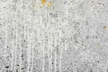 Texture of a concrete wall with cracks and scratches which can be used as a background