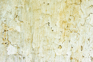 Texture of a concrete wall with cracks and scratches which can be used as a background