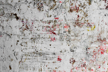 Texture of a concrete wall with cracks and scratches which can be used as a background
