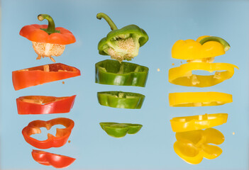 Set of vegetables of bell pepper. Vegetables are cut to pieces on white background.