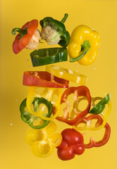 Set of vegetables of bell pepper. Vegetables are cut to pieces on white background.