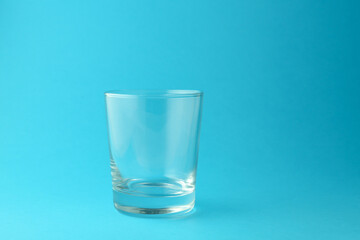  empty glass on blue background