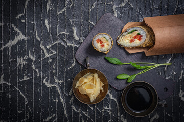 Still life. Japanese cuisine- roll in a package