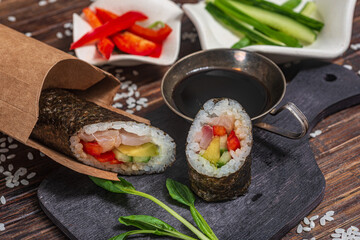 Still life. Japanese cuisine- roll in a package