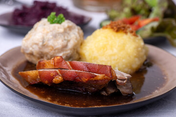 bavarian roasted pork with different dumplings