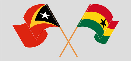 Fototapeta na wymiar Crossed and waving flags of East Timor and Ghana