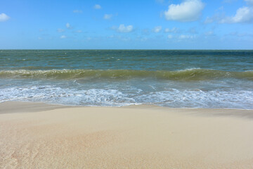 Fototapeta na wymiar The sea, beach and blue sky