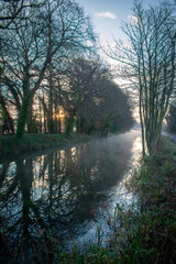 Fototapeta na wymiar Foggy Sunrise at Ancient Irish Canal