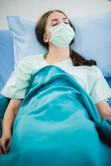 Doctors and patients person wearing surgical face masks in hospital room, health flu disease about coronavirus COVID-19