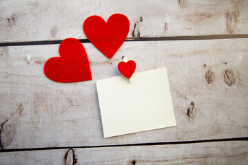 sticker for text with red hearts on wooden background