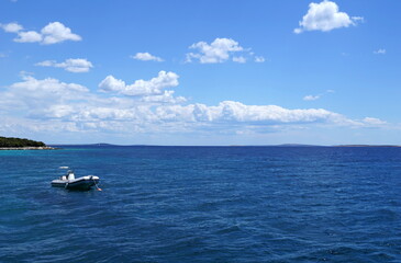 Fototapeta na wymiar Skyline above ocean and blue lagoon on the summer day
