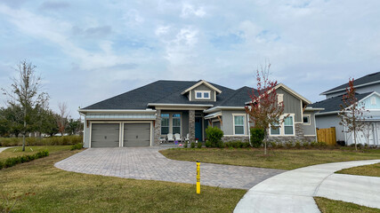 A luxury gray house in the Laureate Park neighborhood