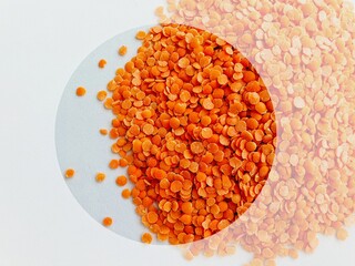 Food concept. Creative layout of red lentils. Food background 