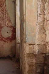 Fragment of an old textured wall close-up selective focus.