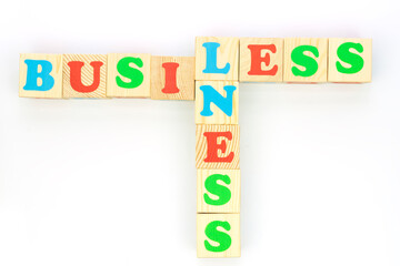 Multicolored cubes on white background word business busiless