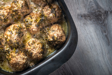 Hommade roasted delicious meatballs in cream sauce. Top view.