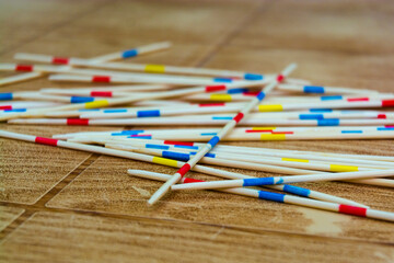 Sticks of a mikado game on a table
