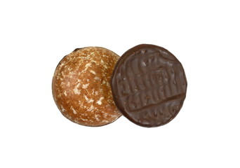 Glazed gingerbread lebkuchens with chocolate isolated on white. German round gingerbread called 'Lebkuchen' 