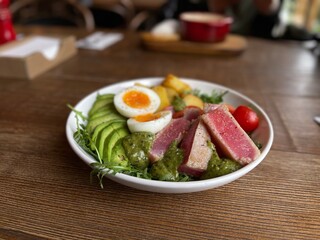 salad with raw tuna, egg and avocado