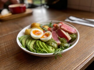 salad with raw tuna, egg and avocado