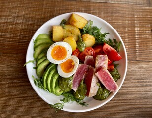 salad with raw tuna, egg and avocado