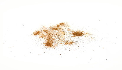 Spice cinnamon powder isolated on a white background. Cinnamon powder spilled on a white surface.