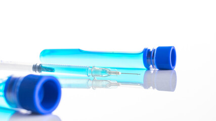 Virus cell. Medical syringe with needle for protection flu virus and coronavirus. Covid vaccine isolated on white. Health care in hospital.