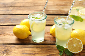 Natural lemonade with mint on wooden table. Summer refreshing drink