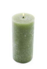 Burning green wax candle isolated on white