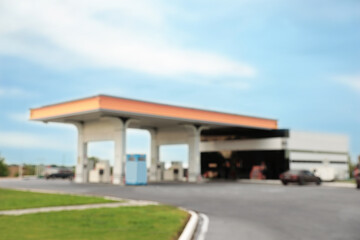 Fototapeta na wymiar Blurred view of modern gas station outdoors