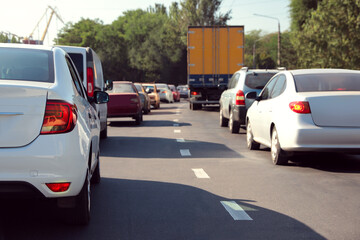 Cars in traffic jam on city street