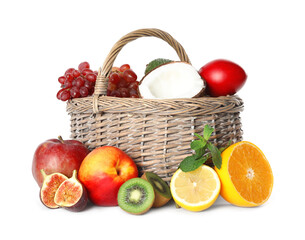 Assortment of fresh exotic fruits in basket on white background