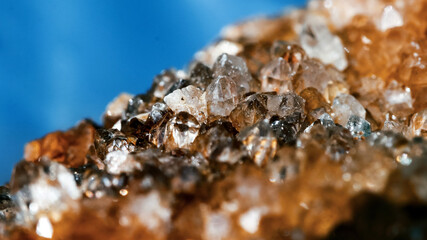 Beautiful yellow and orange crystal magic gem stone. Iridescent natural geometric crystals.