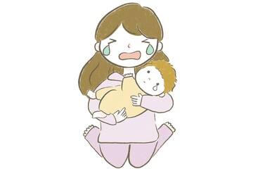 夜泣きにストレスを感じ泣くママ