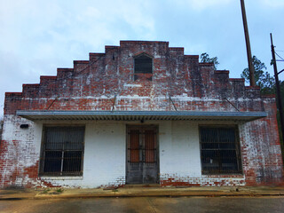 Fototapeta na wymiar Old abandoned brick building entrance