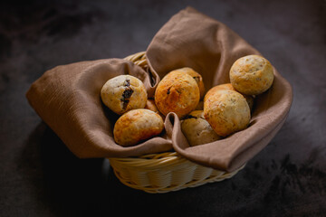 Baked cheese bread with chocolate filling, placed inside a wicker basket
