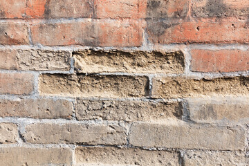Mottled red brick wall surface background texture