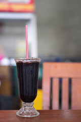 Iced black coffee in the glass.