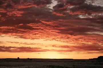 Orange Dawn over Badlands Plains