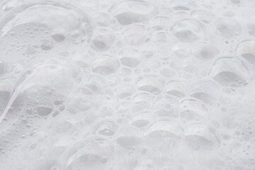 Obraz na płótnie Canvas Shampoo washing and bubbles on top view