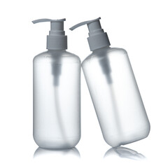 Transparent bottle dispenser pump with tube empty container isolated on white background.