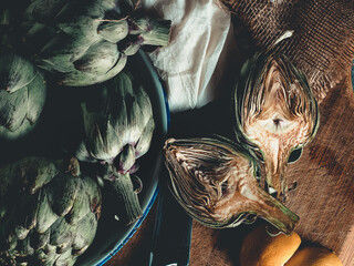ARTICHOKE SPLIT IN HALF, PREPARED FOR COOKING