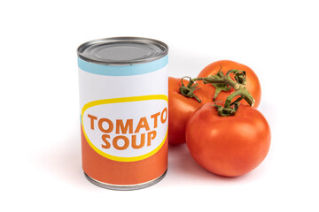 A generic labeled can of tomato soup with a bunch of ripe red tomatoes on the vine isolated on white