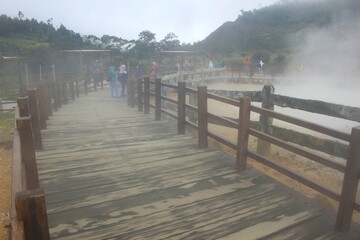 The newest tourist spot of the Kahyangan Bridge from the Sikidang Crater tourist attraction. Dieng Indonesia